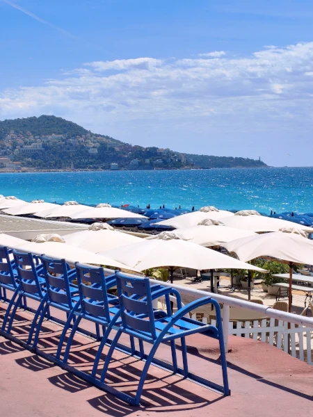 Nice beach with blue chairs