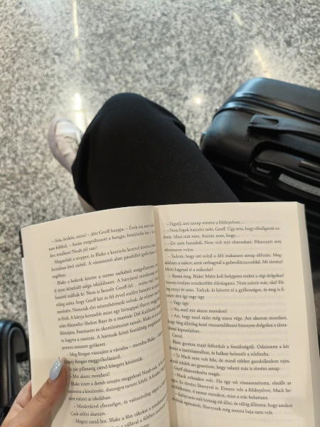 me, waiting at the airport reading